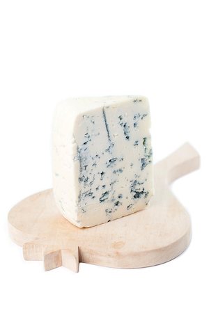 roquefort - Blue cheese on cutting board isolated on white background Stockbilder - Microstock & Abonnement, Bildnummer: 400-06738628