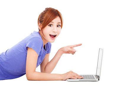 surprised young woman with laptop Stock Photo - Budget Royalty-Free & Subscription, Code: 400-06739631