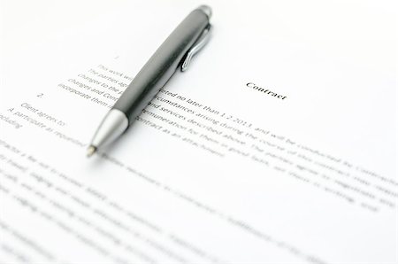 Closeup of a contract and a pen. Focus on a contract sign. Stock Photo - Budget Royalty-Free & Subscription, Code: 400-06739783