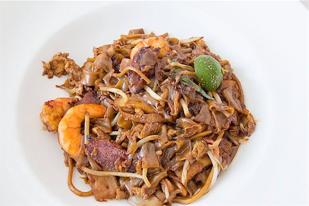 simsearch:400-06750784,k - Singapore Char Kway Teow Rice Noodle Stir Fry with Prawns Chinese Sausage and Fishcake Photographie de stock - Aubaine LD & Abonnement, Code: 400-06745307