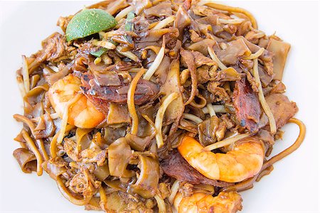 simsearch:400-06750784,k - Singapore Char Kway Teow Rice Noodle Stir Fry with Prawns Chinese Sausage and Fishcake Closeup Photographie de stock - Aubaine LD & Abonnement, Code: 400-06745308