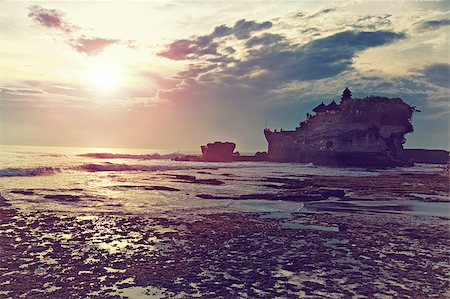 Pura Tanah Lot Temple. One of the most popular and recognizable tourist sights of Bali.Indonesia. Stock Photo - Budget Royalty-Free & Subscription, Code: 400-06745424