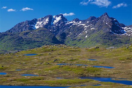 Scenic panorama of lakes and mountains on Lofoten islands in Norway on sunny summer day Photographie de stock - Aubaine LD & Abonnement, Code: 400-06746014