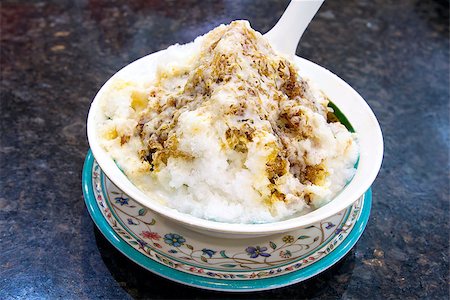 Cendol Shaved Ice Dessert with Gula Melaka Sugar Syrup and Coconut Milk Closeup Stock Photo - Budget Royalty-Free & Subscription, Code: 400-06746701