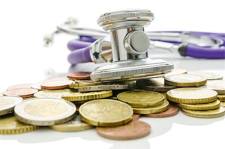 simsearch:400-06860365,k - Stethoscope over Euro coins. Concept of saving bad economy. Stock Photo - Budget Royalty-Free & Subscription, Code: 400-06747659