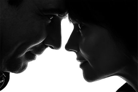 simsearch:400-07097695,k - one caucasian couple woman man face to face in silhouette studio isolated on white background Stock Photo - Budget Royalty-Free & Subscription, Code: 400-06748213