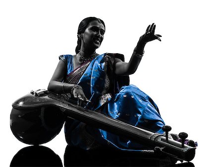 simsearch:400-06748271,k - one indian tempura musician woman in silhouette studio isolated on white background Stockbilder - Microstock & Abonnement, Bildnummer: 400-06748271