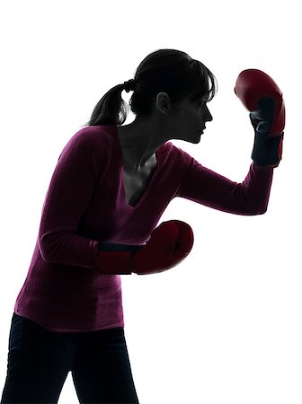 one caucasian woman with boxing gloves  in silhouette studio isolated on white background Stock Photo - Budget Royalty-Free & Subscription, Code: 400-06748292