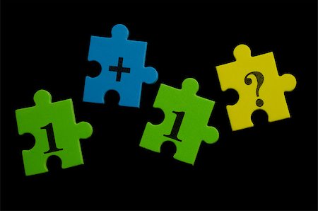 puzzle piece black background - Math colorful puzzle pieces over black background Foto de stock - Super Valor sin royalties y Suscripción, Código: 400-06740692