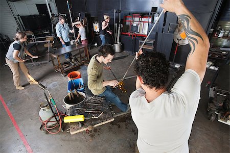 Group of students busy in glass art workshop Stock Photo - Budget Royalty-Free & Subscription, Code: 400-06741239