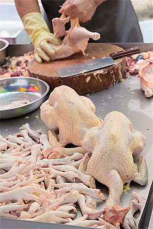 Chicken Butcher at Wet Market in Asia Photographie de stock - Aubaine LD & Abonnement, Code: 400-06741318