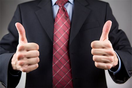 speedskater (artist) - Businessman with two thumbs up. Neutral background Foto de stock - Super Valor sin royalties y Suscripción, Código: 400-06741344