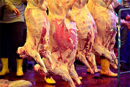 Put the meat hanging in slaughterhouse case of fresh-cut Stock Photo - Budget Royalty-Free & Subscription, Code: 400-06741540