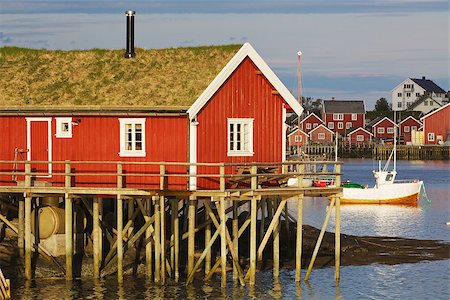 simsearch:400-08428494,k - Typical red rorbu hut with turf roof in town of Reine on Lofoten islands in Norway Stockbilder - Microstock & Abonnement, Bildnummer: 400-06741614