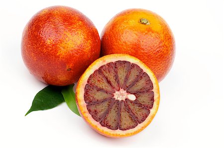 simsearch:400-08012355,k - Two Full Body and Half of Blood Oranges isolated on white background Photographie de stock - Aubaine LD & Abonnement, Code: 400-06741654