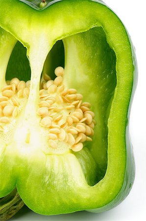 simsearch:693-06497599,k - Cut into Half Green Bell Pepper  and Seeds closeup Fotografie stock - Microstock e Abbonamento, Codice: 400-06741660