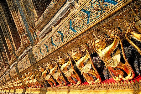 simsearch:400-05344732,k - buddhism golden religious detail palace asia asian exotic siam color colour colourful colorful bright vivid decoration decorative thai ceramic intricate beautiful travel tourism tourist holidays traditional ancient old heritage historical tropical bright oriental orient east Stock Photo - Budget Royalty-Free & Subscription, Code: 400-06742009