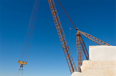 Detail of a crane lifting marble blocks in a quarry, Alentejo, Portugal Stock Photo - Budget Royalty-Free & Subscription, Code: 400-06742151