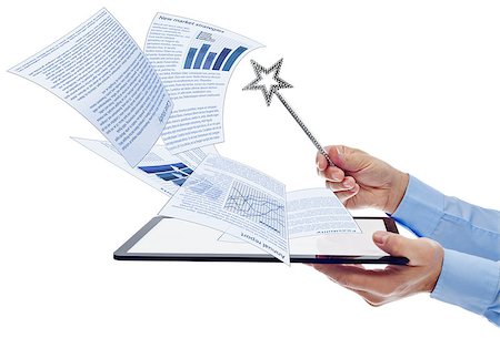 simsearch:400-06952963,k - Businessman managing electronic documents using tablet computer and magic wand - isolated Stock Photo - Budget Royalty-Free & Subscription, Code: 400-06742752