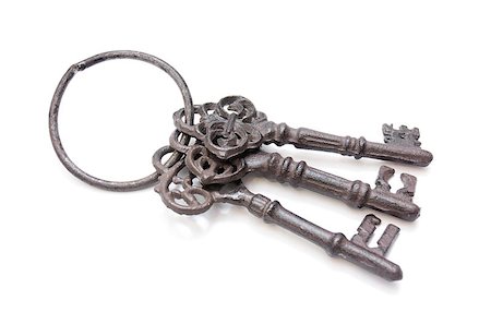 Three old keys isolated on a white background Foto de stock - Royalty-Free Super Valor e Assinatura, Número: 400-06743071