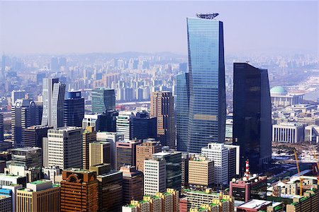 simsearch:400-07265197,k - Downtown cityscape of Seoul, South Kore with smog in the distance. Fotografie stock - Microstock e Abbonamento, Codice: 400-06743369
