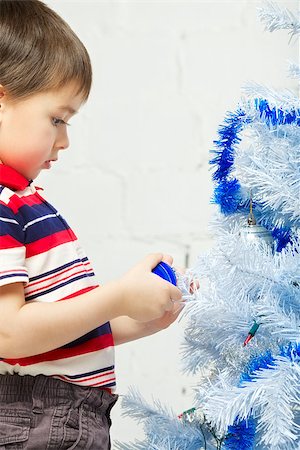 simsearch:400-07088886,k - beautiful happy small kid decorate christmas tree Stock Photo - Budget Royalty-Free & Subscription, Code: 400-06743599
