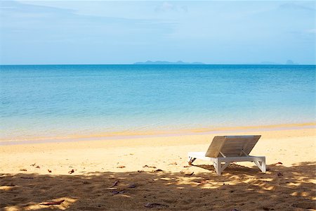 simsearch:851-02958595,k - chaise lounge on a beach at summer day Photographie de stock - Aubaine LD & Abonnement, Code: 400-06743593