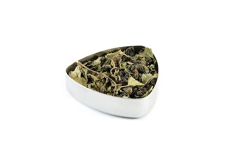 dry cured - Mix of green tea "Gunpowder" and mint from Morocco in a metal container Stock Photo - Budget Royalty-Free & Subscription, Code: 400-06743658