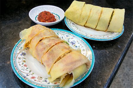 peranakan - Nyonya Peranakan Popiah Wrap with Chili Sauce Closeup Photographie de stock - Aubaine LD & Abonnement, Code: 400-06743693