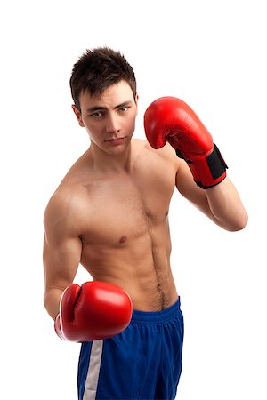 simsearch:400-04922500,k - Portrait of young boxer over white background Photographie de stock - Aubaine LD & Abonnement, Code: 400-06743879