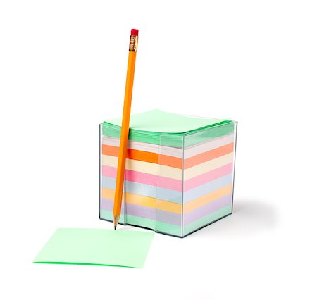 sticky notes messages - Container with note papers in different colors on white background Stock Photo - Budget Royalty-Free & Subscription, Code: 400-06758393