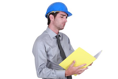simsearch:400-05714957,k - businessman wearing helmet taking notes Stock Photo - Budget Royalty-Free & Subscription, Code: 400-06758425