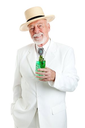 simsearch:400-08040653,k - Handsome Kentucky colonel or Southern gentleman drinking a mint julep for Derby Day.  Isolated on white. Stock Photo - Budget Royalty-Free & Subscription, Code: 400-06759364