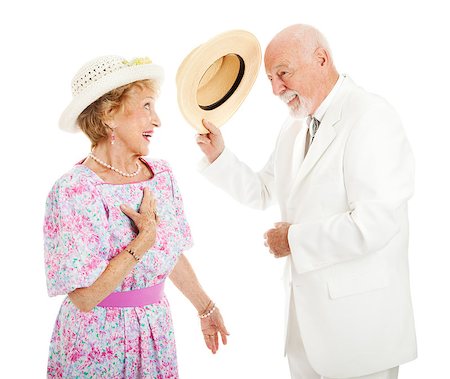 simsearch:400-08040653,k - Southern gentleman tipping his hat to a pretty southern belle. Isolated on white Stock Photo - Budget Royalty-Free & Subscription, Code: 400-06759378