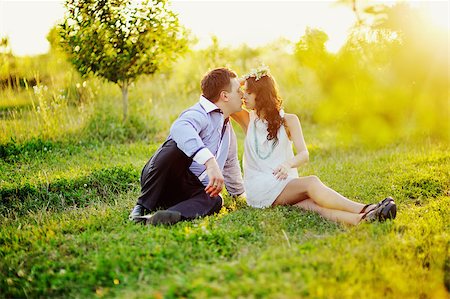 Happy young couple having  great time outside, warm picture Stock Photo - Budget Royalty-Free & Subscription, Code: 400-06759752