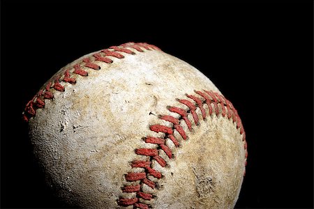 A low key shot of an old hardball for a great summer activity. Stock Photo - Budget Royalty-Free & Subscription, Code: 400-06759762