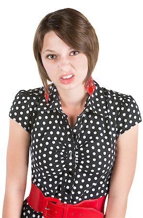Offended European woman in polka dot dress Stock Photo - Budget Royalty-Free & Subscription, Code: 400-06759938