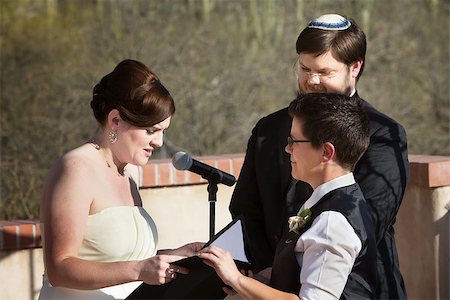 Lesbian white couple reciting marriage vows in ceremony Stock Photo - Budget Royalty-Free & Subscription, Code: 400-06759985