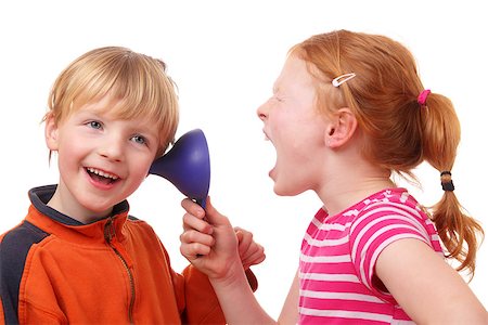 Kids shouting through a cone on white background Stock Photo - Budget Royalty-Free & Subscription, Code: 400-06750004