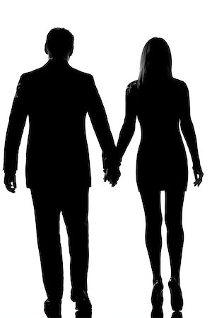 rear view one lovers caucasian couple man and woman walking hand in hand in studio silhouette isolated on white background Stock Photo - Budget Royalty-Free & Subscription, Code: 400-06750058