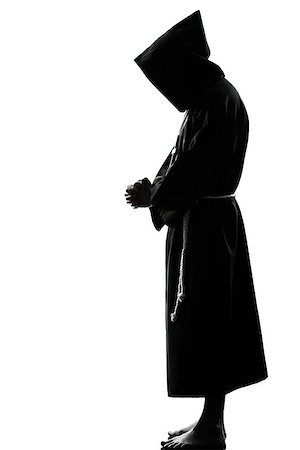 simsearch:614-02764159,k - one caucasian man priest praying silhouette in studio isolated on white background Stockbilder - Microstock & Abonnement, Bildnummer: 400-06750130