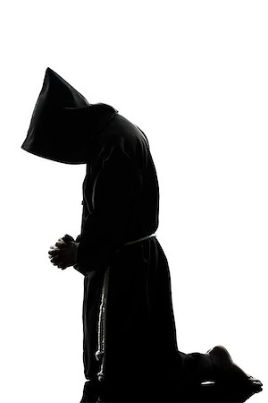 simsearch:614-02764159,k - one caucasian man priest praying silhouette in studio isolated on white background Stockbilder - Microstock & Abonnement, Bildnummer: 400-06750131