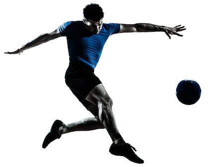 football man kicking white background - one caucasian man flying kicking playing soccer football player silhouette  in studio isolated on white background Stock Photo - Budget Royalty-Free & Subscription, Code: 400-06750142
