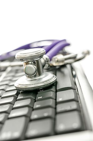 simsearch:400-05244427,k - Computer keyboard and a medical stethoscope. With copy space. Stock Photo - Budget Royalty-Free & Subscription, Code: 400-06750225