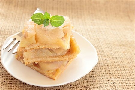 pie with plate and fork - stack of apple pie on canvas Stock Photo - Budget Royalty-Free & Subscription, Code: 400-06750259