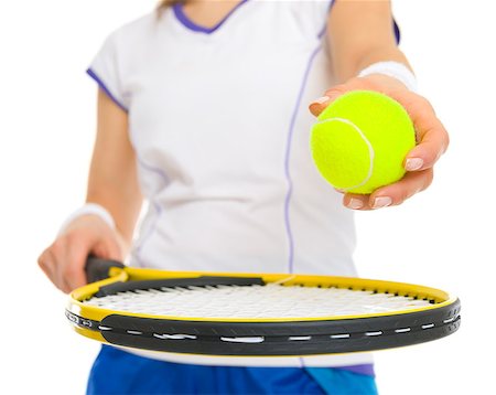 simsearch:640-03264942,k - Closeup on female tennis player with racket and ball Stock Photo - Budget Royalty-Free & Subscription, Code: 400-06750285