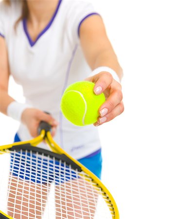 simsearch:640-03264942,k - Closeup on female tennis player serving ball Stock Photo - Budget Royalty-Free & Subscription, Code: 400-06750286