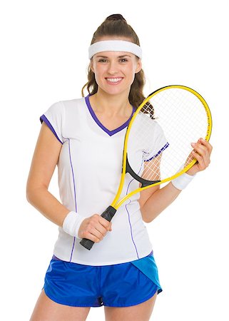 Portrait of smiling female tennis player with racket Stock Photo - Budget Royalty-Free & Subscription, Code: 400-06750307