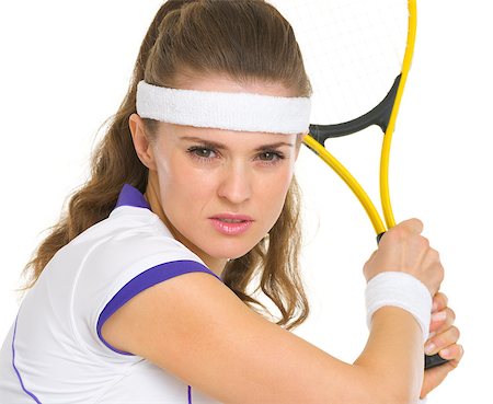 Portrait of confident female tennis player ready to hit ball Stock Photo - Budget Royalty-Free & Subscription, Code: 400-06750329