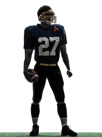 one caucasian quarterback american football player man standing in silhouette studio isolated on white background Foto de stock - Super Valor sin royalties y Suscripción, Código: 400-06750432